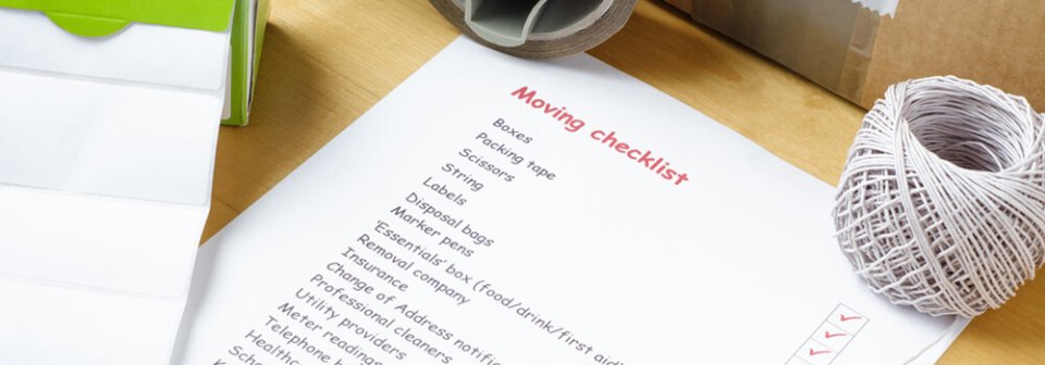 A document that reads moving checklist to illustrate a moving checklist to complete before moving to a new home.