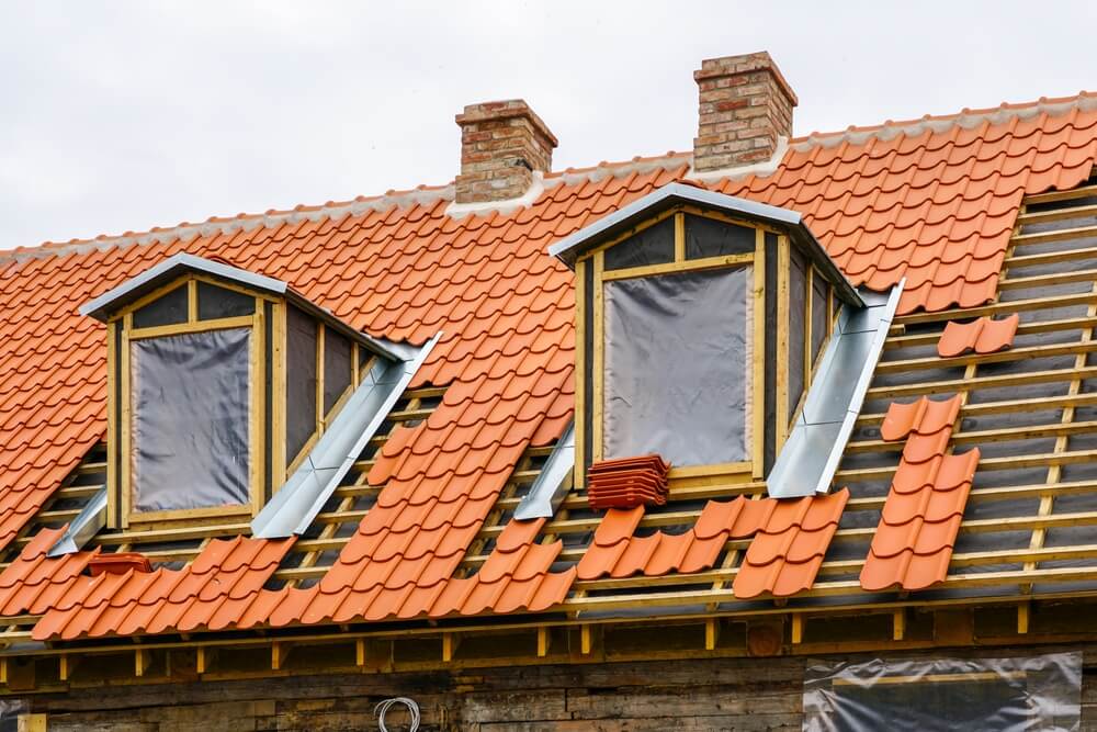 Restoration of roof wooden structures and clay tiles roofing replacement of historic house